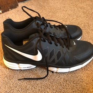Nike men’s training shoes- black with white logos